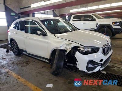 Czwarte zdjęcie samochodu z boku: 2021 BMW X1 XDRIVE28I VIN:WBXJG9C01M3M76507 - miniatura