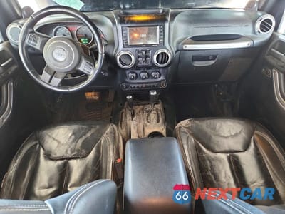 Zdjęcie 8 z 13 samochodu: 2013 JEEP WRANGLER UNLIMITED SAHARA VIN:1C4BJWEG3DL552465 - miniatura