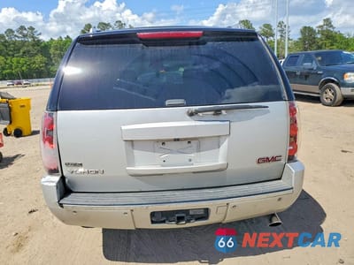 Zdjęcie 6 z 11 samochodu: 2010 GMC YUKON DENALI VIN:1GKUKEEF9AR287121 - miniatura