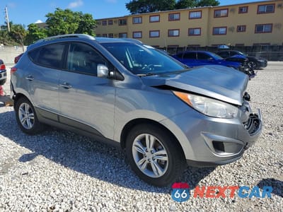 Czwarte zdjęcie samochodu z boku: 2012 HYUNDAI TUCSON GLS VIN:KM8JU3AC6CU324419 - miniatura