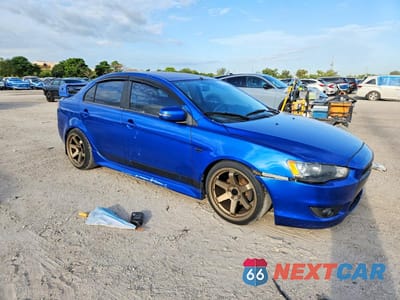 Czwarte zdjęcie samochodu z boku: 2015 MITSUBISHI LANCER ES VIN:JA32U2FU4FU001512 - miniatura