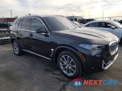 Czwarte zdjęcie samochodu z boku: 2026 BMW X5 XDRIVE40I VIN:5UX23EU05T9265843 - miniatura