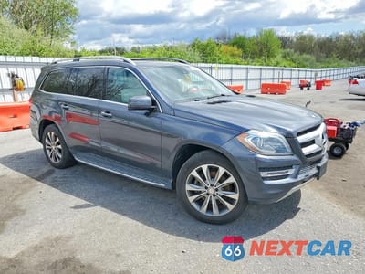 Czwarte zdjęcie samochodu z boku: 2015 MERCEDES-BENZ GL 450 4MATIC VIN:4JGDF6EE2FA464316 - miniatura