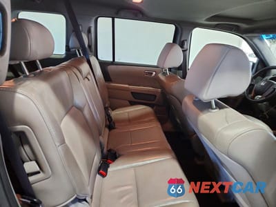 Zdjęcie 11 z 12 samochodu: 2011 HONDA PILOT EXL VIN:5FNYF4H50BB026935 - miniatura