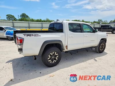 Trzecie zdjęcie samochodu z tyłu: 2022 TOYOTA TACOMA TRD OFF-ROAD VIN:3TMAZ5CN8NM175504 - miniatura