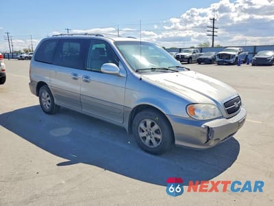 Czwarte zdjęcie samochodu z boku: 2005 KIA SEDONA LX VIN:KNDUP132556764575 - miniatura