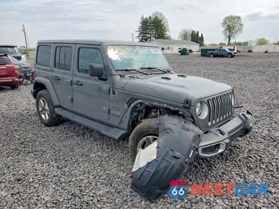 Czwarte zdjęcie samochodu z boku: 2020 JEEP WRANGLER UNLIMITED SAHARA VIN:1C4HJXEG4LW335729 - miniatura