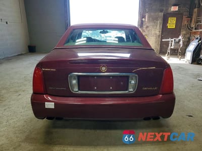 Zdjęcie 6 z 12 samochodu: 2002 CADILLAC DEVILLE VIN:1G6KD54Y62U267961 - miniatura