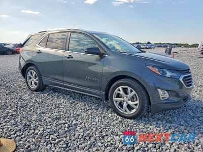 Czwarte zdjęcie samochodu z boku: 2018 CHEVROLET EQUINOX LT VIN:3GNAXKEX9JS506896 - miniatura