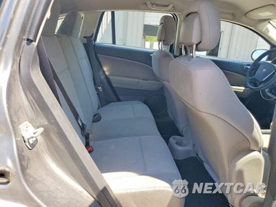 Zdjęcie 10 z 13 samochodu: 2011 DODGE CALIBER MAINSTREET VIN:1B3CB3HA8BD257426 - miniatura
