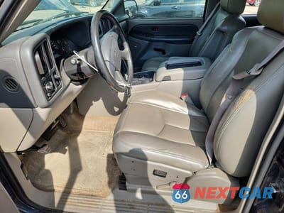 Zdjęcie 7 z 13 samochodu: 2003 GMC YUKON VIN:1GKEC13ZX3J337291 - miniatura