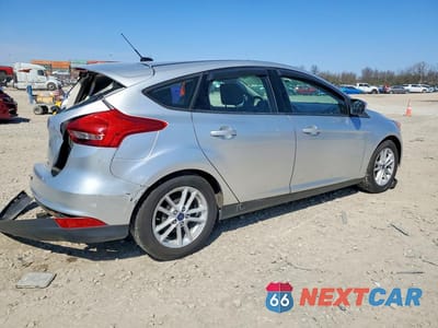 Trzecie zdjęcie samochodu z tyłu: 2018 FORD FOCUS SE VIN:1FADP3K22JL234322 - miniatura