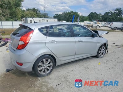Trzecie zdjęcie samochodu z tyłu: 2013 HYUNDAI ACCENT SE VIN:KMHCU5AEXDU059351 - miniatura