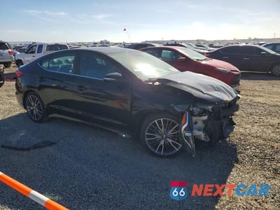 Czwarte zdjęcie samochodu z boku: 2018 HYUNDAI ELANTRA SPORT VIN:KMHD04LB3JU520026 - miniatura