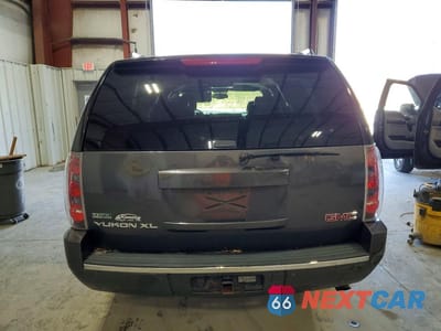 Zdjęcie 6 z 14 samochodu: 2010 GMC YUKON XL DENALI VIN:1GKUKMEF2AR245156 - miniatura