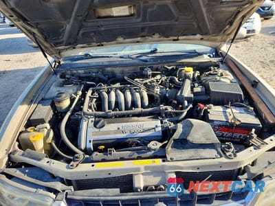 Zdjęcie 11 z 12 samochodu: 1999 NISSAN MAXIMA SE LIMITED VIN:JN1CA21AXXT104682 - miniatura