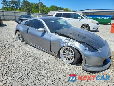 Czwarte zdjęcie samochodu z boku: 2003 NISSAN 350Z BASE VIN:JN1AZ34D83T120420 - miniatura