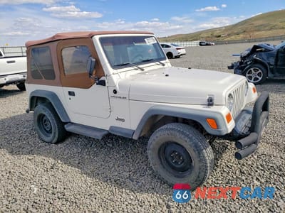 Czwarte zdjęcie samochodu z boku: 1997 JEEP WRANGLER / TJ SE VIN:1J4FY29P3VP418690 - miniatura