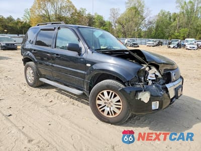 Czwarte zdjęcie samochodu z boku: 2005 MERCURY MARINER VIN:4M2CU57165DJ31005 - miniatura