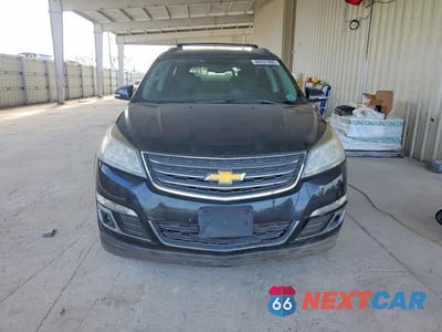 Piąte zdjęcie samochodu w środku: 2014 CHEVROLET TRAVERSE LT VIN:1GNKVHKD3EJ107688 - miniatura