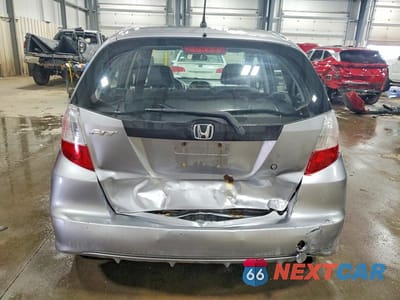 Zdjęcie 6 z 12 samochodu: 2009 HONDA FIT VIN:JHMGE88249S008865 - miniatura