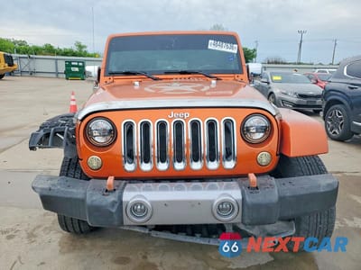 Piąte zdjęcie samochodu w środku: 2011 JEEP WRANGLER UNLIMITED SPORT VIN:1J4BA3H16BL520395 - miniatura