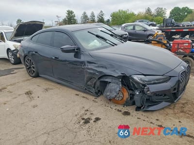 Czwarte zdjęcie samochodu z boku: 2024 BMW M440XI GRAN COUPE VIN:WBA13AW08RFR08311 - miniatura