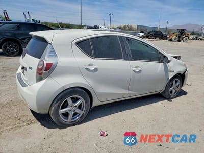 Trzecie zdjęcie samochodu z tyłu: 2013 TOYOTA PRIUS C VIN:JTDKDTB30D1529759 - miniatura