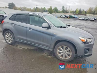 Czwarte zdjęcie samochodu z boku: 2014 MITSUBISHI OUTLANDER SPORT ES VIN:4A4AP3AU8EE012189 - miniatura