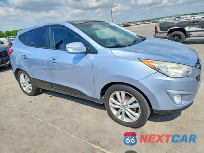 Czwarte zdjęcie samochodu z boku: 2013 HYUNDAI TUCSON LIMITED VIN:KM8JU3AC2DU616831 - miniatura