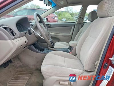 Zdjęcie 7 z 12 samochodu: 2003 TOYOTA CAMRY LE VIN:4T1BE32K13U252665 - miniatura