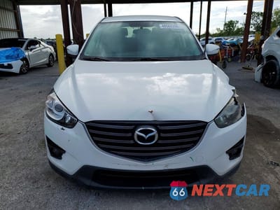 Piąte zdjęcie samochodu w środku: 2016 MAZDA CX-5 TOURING VIN:JM3KE2CY4G0635635 - miniatura