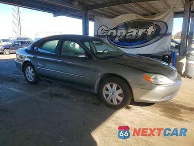 Czwarte zdjęcie samochodu z boku: 2003 FORD TAURUS SEL VIN:1FAHP56S23G149287 - miniatura