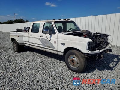 Czwarte zdjęcie samochodu z boku: 1997 FORD F350 VIN:1FTJW35F2VEA53097 - miniatura