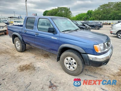 Czwarte zdjęcie samochodu z boku: 2000 NISSAN FRONTIER XE VIN:1N6ED27Y0YC419264 - miniatura