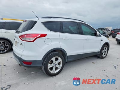 Trzecie zdjęcie samochodu z tyłu: 2015 FORD ESCAPE SE VIN:1FMCU0GX2FUA16895 - miniatura