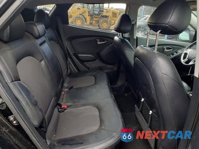 Zdjęcie 10 z 12 samochodu: 2011 HYUNDAI TUCSON GLS VIN:KM8JUCAC9BU156922 - miniatura
