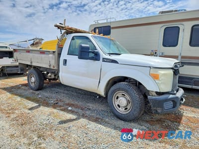 Czwarte zdjęcie samochodu z boku: 2011 FORD F350 SUPER DUTY DUMP TRUCK VIN:1FDBF3E69BEB77203 - miniatura