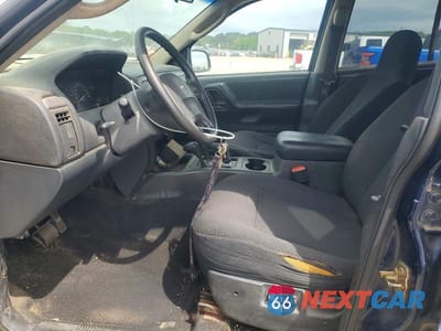 Zdjęcie 7 z 13 samochodu: 2004 JEEP GRAND CHEROKEE LAREDO VIN:1J4GW48S54C134012 - miniatura