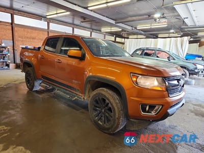 Czwarte zdjęcie samochodu z boku: 2017 CHEVROLET COLORADO LT VIN:1GCGTCEN1H1305766 - miniatura