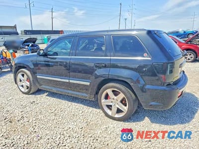 Drugie zdjęcie samochodu z przodu: 2009 JEEP GRAND CHEROKEE SRT-8 VIN:1J8HR78W19C542318 - miniatura