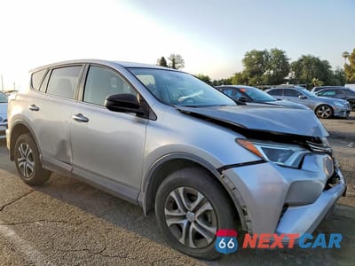 Czwarte zdjęcie samochodu z boku: 2018 TOYOTA RAV4 LE VIN:JTMZFREV1JJ197481 - miniatura
