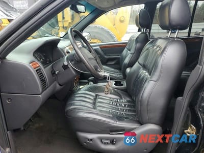 Zdjęcie 7 z 11 samochodu: 1999 JEEP GRAND CHEROKEE LIMITED VIN:1J4GW68S3XC615263 - miniatura