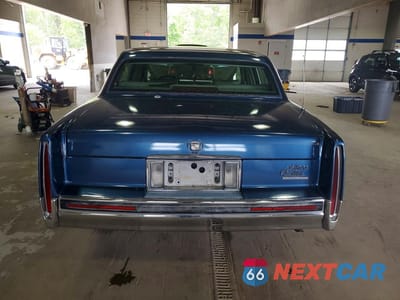 Zdjęcie 6 z 13 samochodu: 1992 CADILLAC DEVILLE VIN:1G6CD53B7N4251063 - miniatura