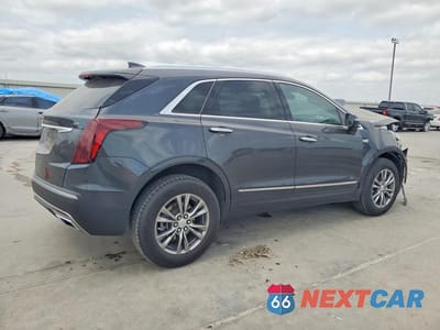 Trzecie zdjęcie samochodu z tyłu: 2022 CADILLAC XT5 PREMIUM LUXURY VIN:1GYKNCRS4NZ172366 - miniatura