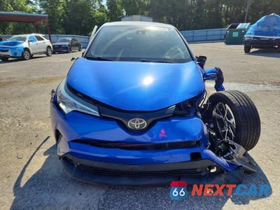 Piąte zdjęcie samochodu w środku: 2019 TOYOTA C-HR XLE VIN:NMTKHMBX9KR089231 - miniatura