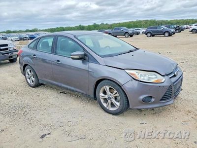 Czwarte zdjęcie samochodu z boku: 2014 FORD FOCUS SE VIN:1FADP3F2XEL149339 - miniatura