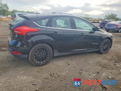 Trzecie zdjęcie samochodu z tyłu: 2018 FORD FOCUS BEV VIN:1FADP3R49JL225964 - miniatura