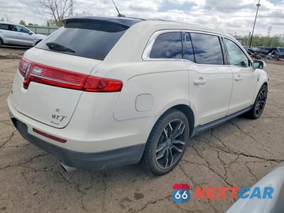 Trzecie zdjęcie samochodu z tyłu: 2012 LINCOLN MKT VIN:2LMHJ5AT0CBL51533 - miniatura