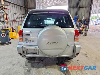 Zdjęcie 6 z 12 samochodu: 2002 TOYOTA RAV4 BASE VIN:JTEGH20V720077820 - miniatura